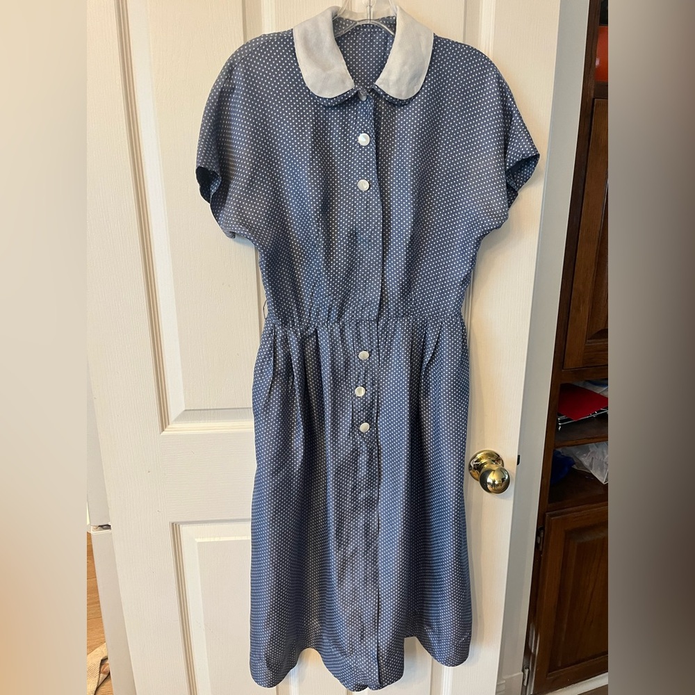 Vintage 1950s era classic women’s dress with pockets and heart polka dots